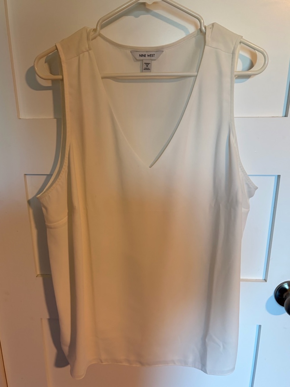 White Sleeveless Blouse